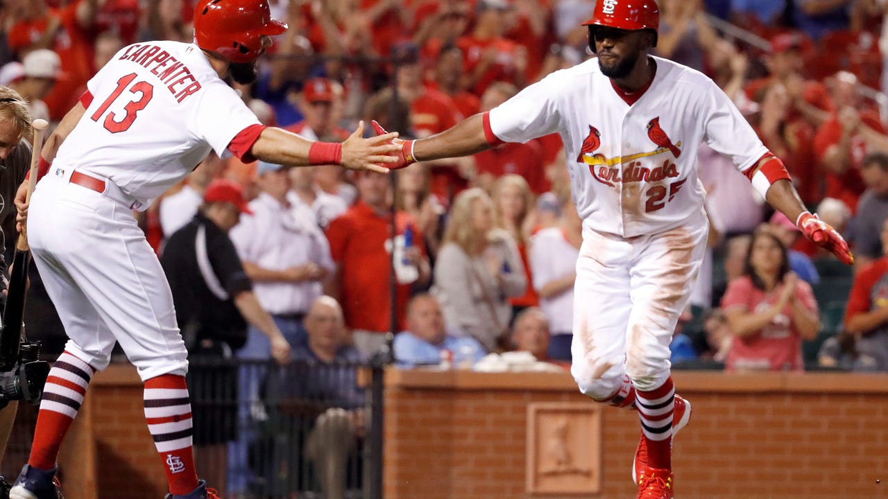 Carpenter and Fowler are clicking as Cards host Brewers in doubleheader